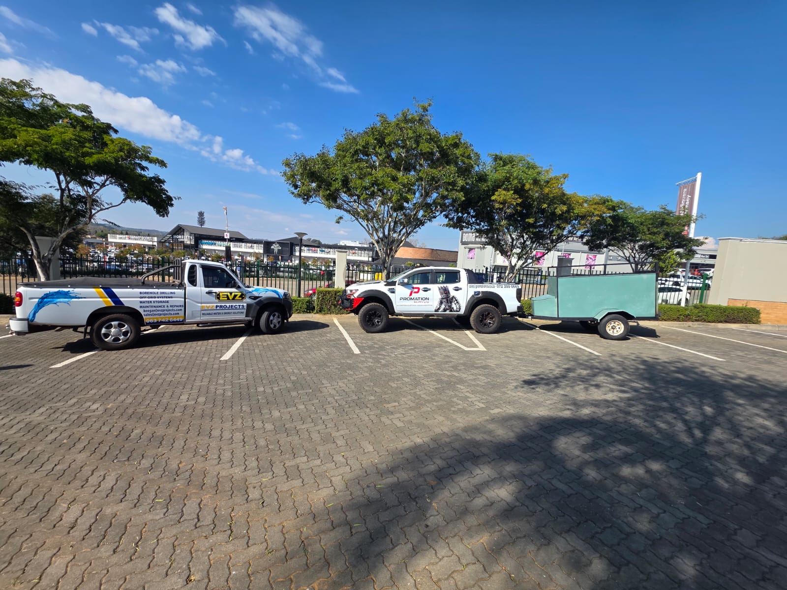 Promation SA and EVZ Projects vehicles with site trailer