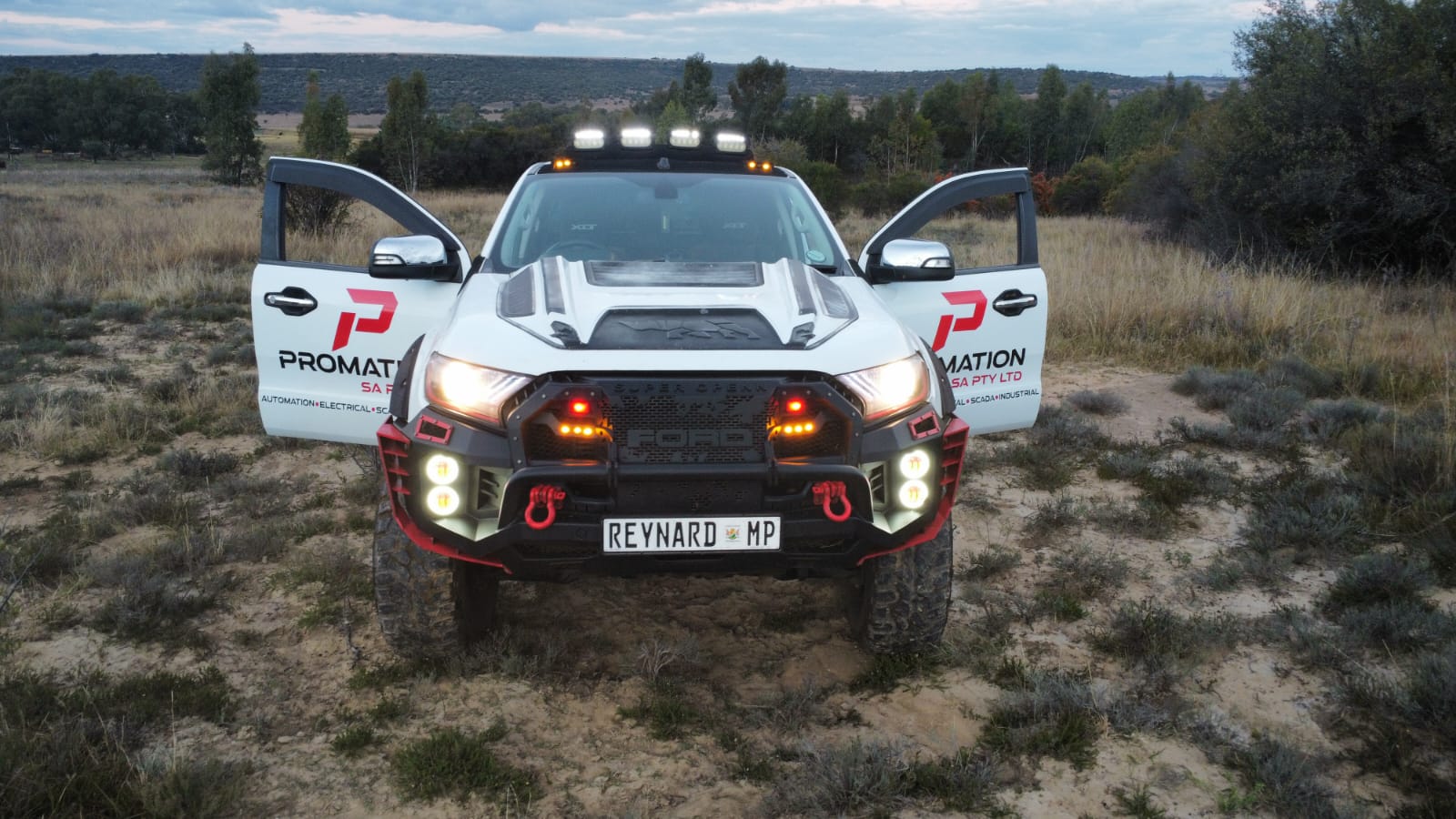 Promation SA Ford Ranger field vehicle, doors open at dusk